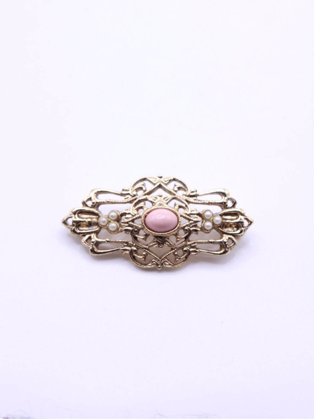 Vintage-Inspired Gold tone Filigree Brooch with Pink Cabochon